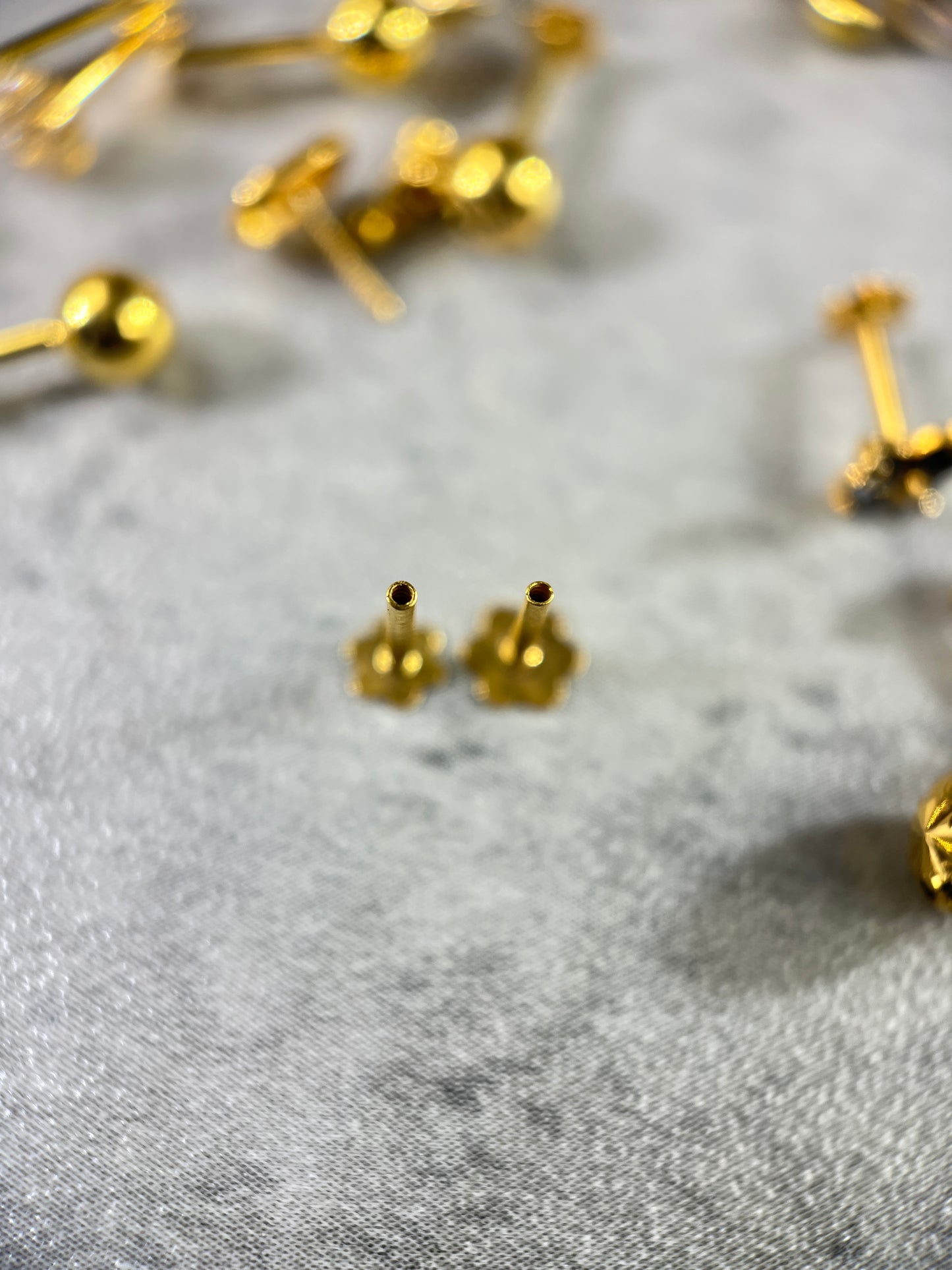Gold Faceted Sphere Stud