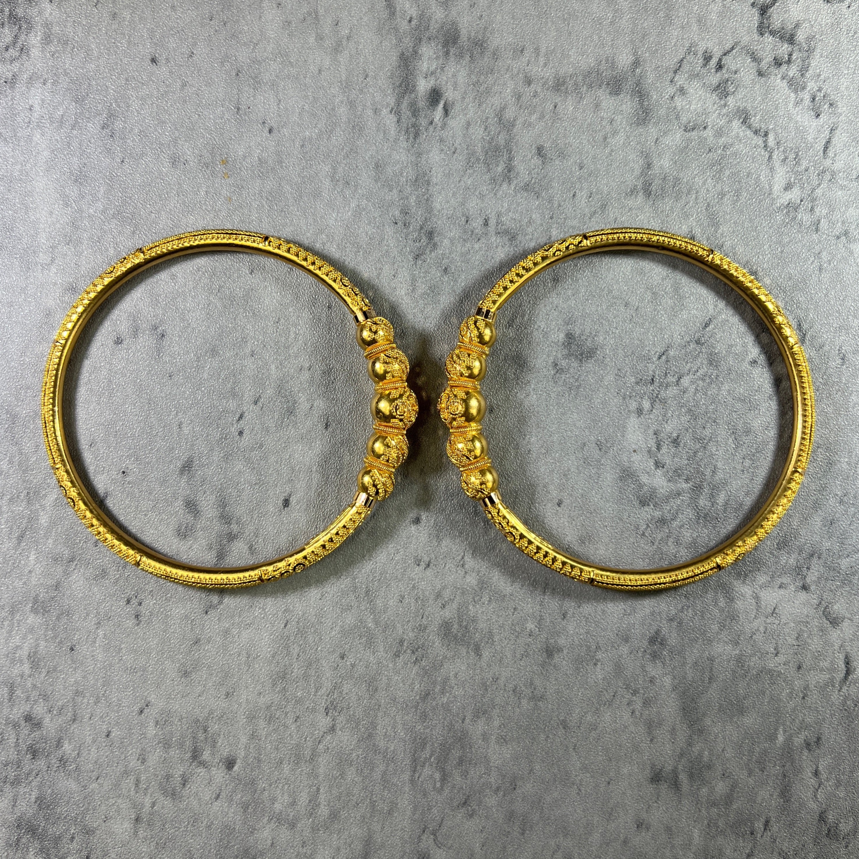 Balls bangles deals gold designs