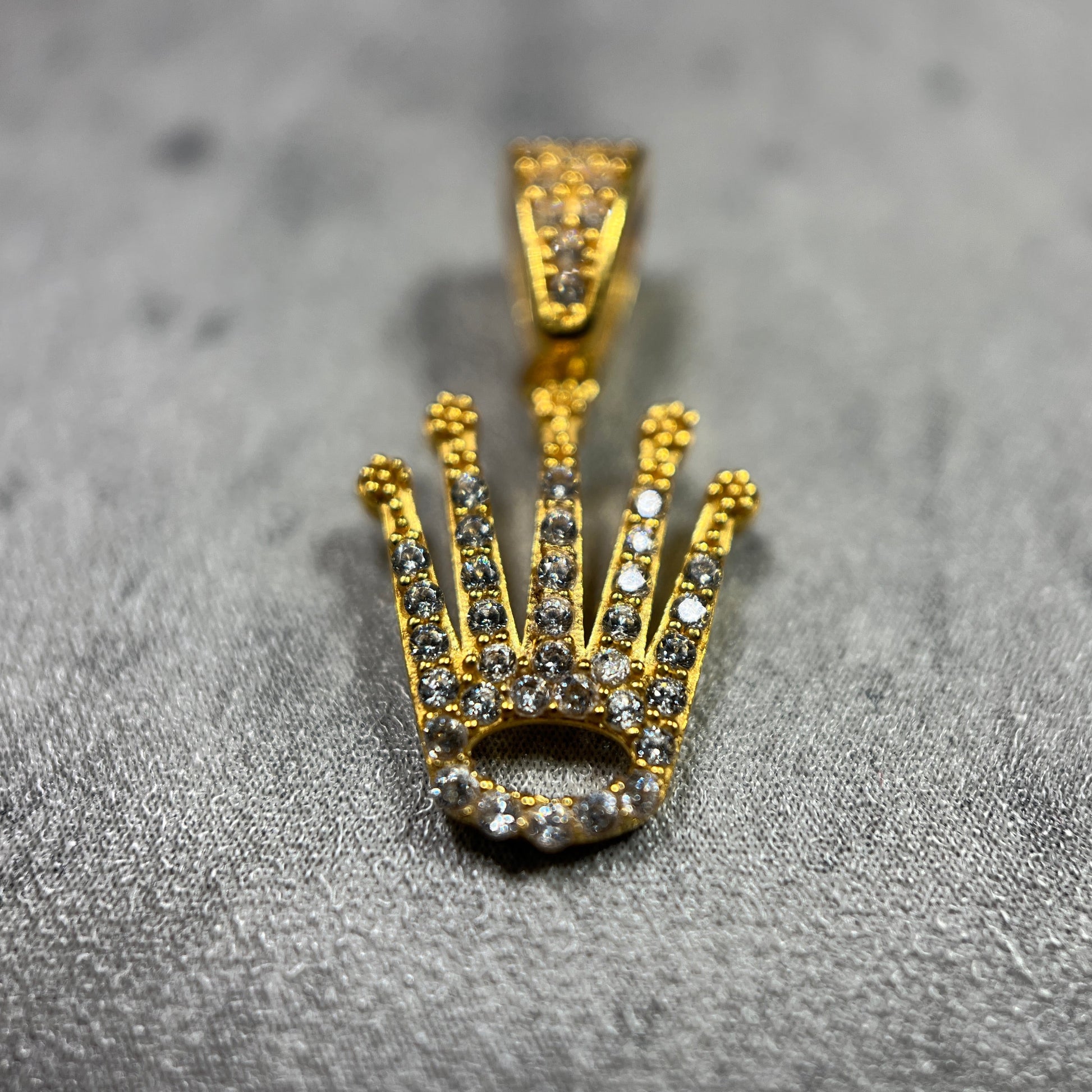 22ct yellow gold 5-finger pendant featuring hand-picked cubic zirconia stones, including the bail. New design for elevated elegance