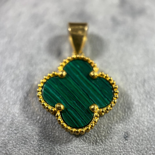 Handcrafted green clover pendant, symbolizing luck and nature, available now